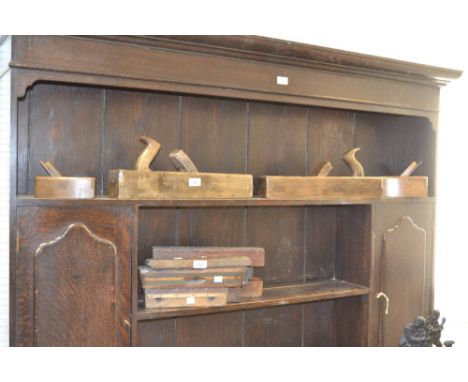 Woodworking tools- a pair of wood planes; another pair
