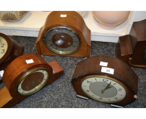 An oak mantel clock, c.1930;  others (3)