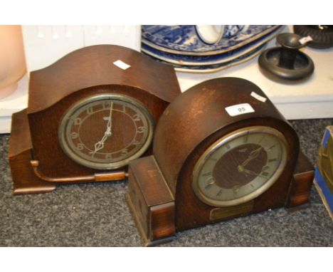An oak mantel clock, c.1930;  another (2)