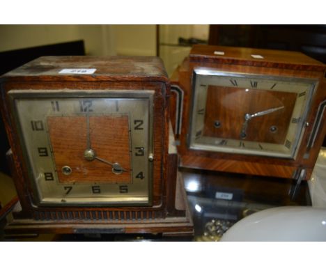An Art Deco walnut mantel clock, c.1930;  another oak (2)