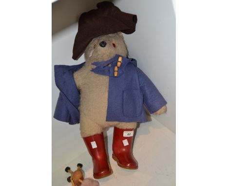 A Paddington Bear wearing red Dunlop Wellington boots ; a Pelham Puppet, Foal 