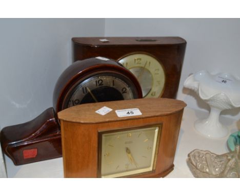 A Twin Savings  oak mantel clock, c.1930;  other mantel clocks (3)