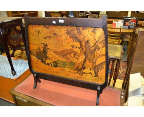 An early 20th poker work fire screen, decorated with a goatherd boy c.1910