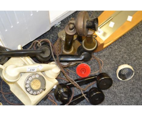 A reproduction copper stick telephone , various handsets ;  etc 