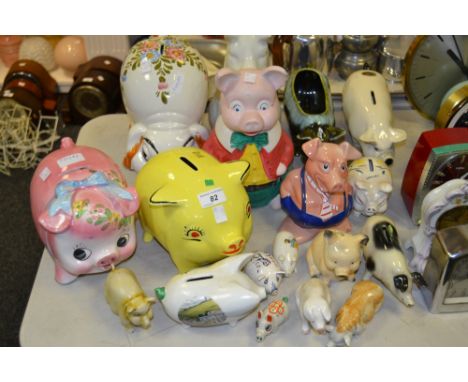 A Wade pig money box, other pig money box ;  etc 