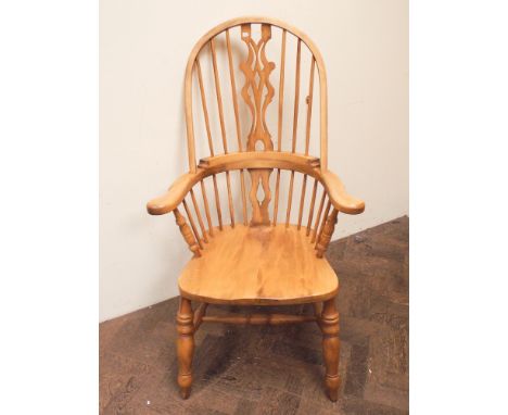 A reproduction high stick back Windsor elbow chair 