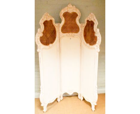 A French style cream and cane panel three folding screen