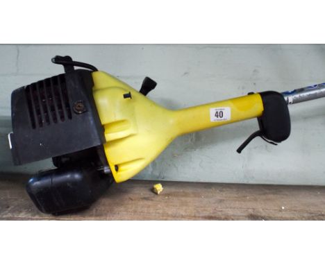 A McCullough petrol engine strimmer