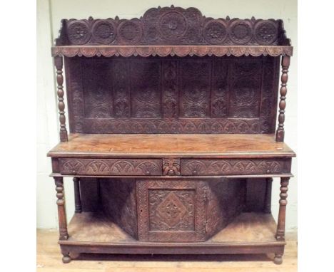 French carved oak buffet serving table with shelf back drawers and cupboards under 156cms wide 178cms high and 52cms deep