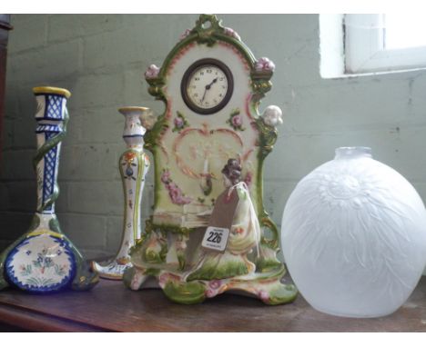 Victorian decorative mantle clock in china case with girl playing piano, a pressed glass vase and two Quimper candlesticks 