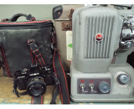 A camera and an old boxed projector