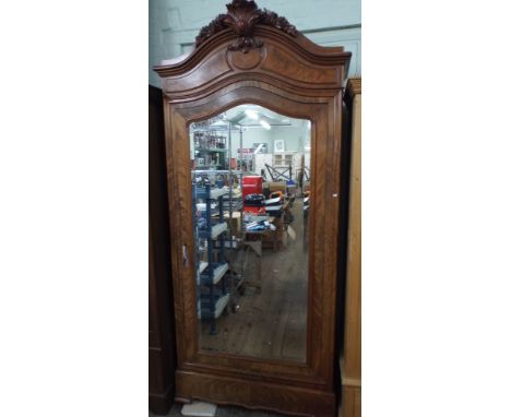 A French walnut armoire with large bevelled mirror door fitted interior shelf 236cms high, 104cms wide, 42ms deep     Has 4 s