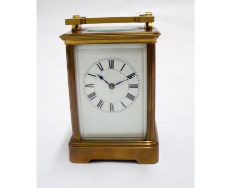 Paris made brass carriage clock, with key, height including handle 19 cms.