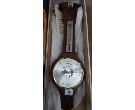 A modern thermometer barometer