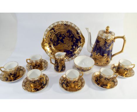 Royal Crown Derby Paradise cobalt blue coffee set, six cups and saucers, coffee pot, cream jug and sugar basin and a cobalt b