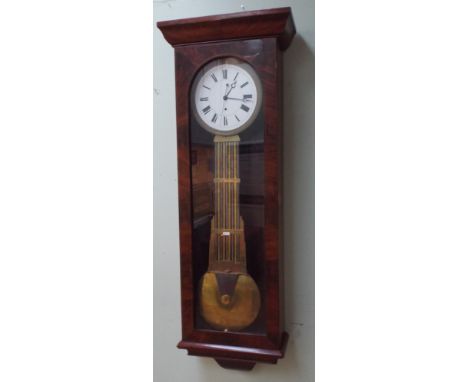 A French Regency period regulated wall clock with brass grid iron pendulum, sweep second hand and power maintenance, approx 1