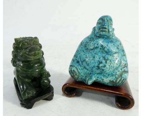 A Jade carved Temple Lion and a turquoise matrix carved Buddha both with hardwood bases 