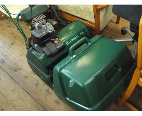 A Balmoral 17SE petrol engine cylinder self propelled lawn mower with electric start in working order 