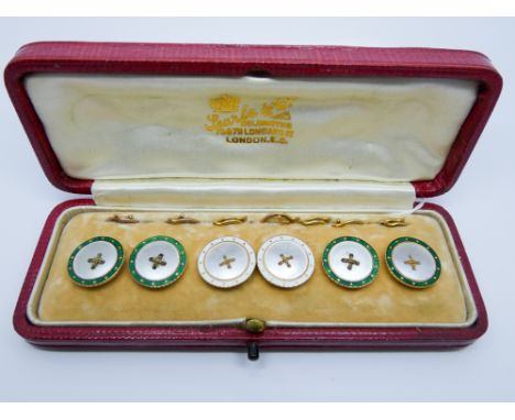 A set of  Edwardian 15ct yellow gold and enamel button style shirt studs with cufflink style links in fitted box by Searle & 