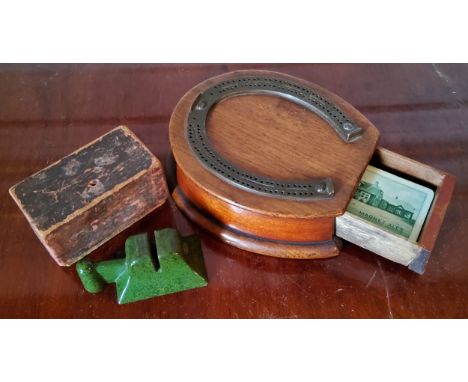 A late Victorian oak brass mounted Horseshoe cribbage board with drawer; a boxed bakelite 'Rotary' knife sharpener 