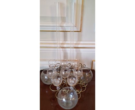 Eight gold painted metal &amp; glass tea light holders; three glass bowls, &amp; a tall glass table centre vases (12) 