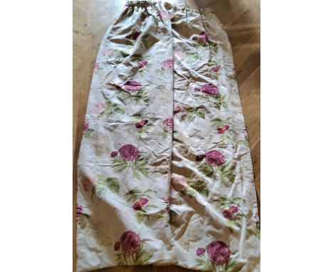 A pair of pencil pleat linen curtains printed with peonies and nectarines in tones of red, pink &amp; green on a cream ground