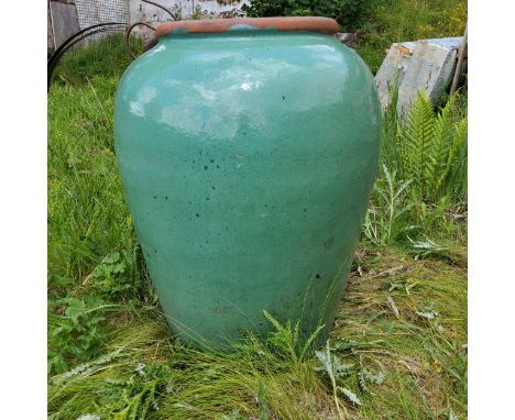 A monumental turquoise glazed terracotta amphora style garden planter, Approximately 80cm high 