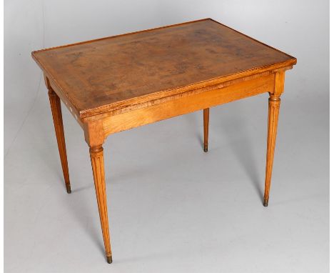 
	
		A 19th century French burr walnut and satin birch games table, the removable baize laid reversible tray top above interi