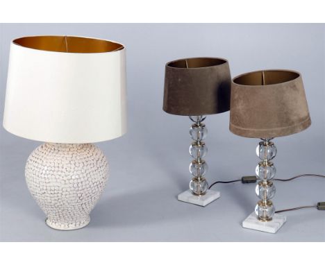 
	
		Table lighting to include; a pair of Porte Romana bronzed tall table lights with half shades 95.5 cm high; a pair of bra