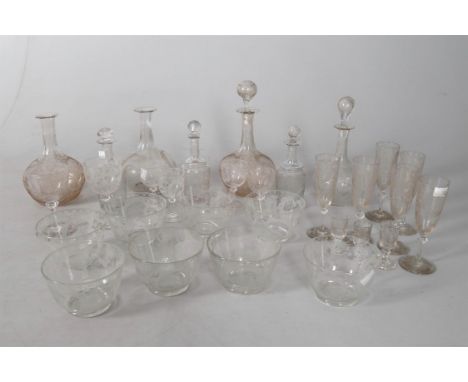 
	
		A collection of glassware including decanters, wine glasses and bowls, comprising a matched 19th century part suite, tal