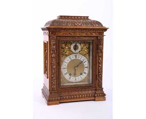 VICTORIAN CARVED OAK AND WALNUT BRACKET CLOCK
with signed Lenzkirch movement, the two train key wind movement striking on coi