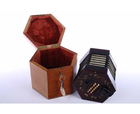 LATE NINETEENTH CENTURY ROSEWOOD FOURTY-EIGHT BUTTON CONCERTINA BY LACHENAL 
numbered 45389, with pierced rosewood hexagonal 