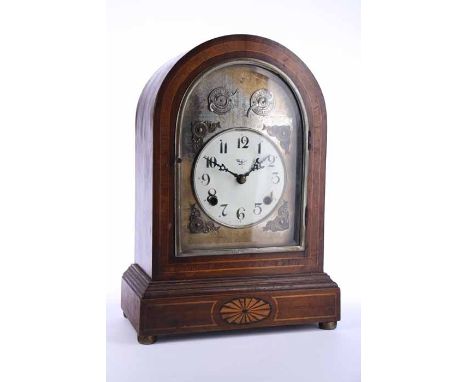 EDWARDIAN INLAID MAHOGANY MANTEL CLOCK
retailed by Edward, Glasgow, the unsigned brass twin train movement striking on a coil