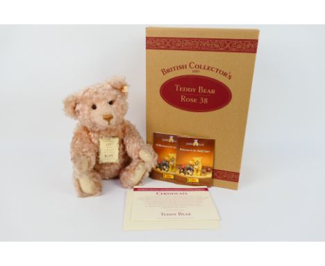 Steiff - A boxed limited edition #654580 rose pink mohair Steiff bear - The 'British Collectors 1997' bear has metal joints, 