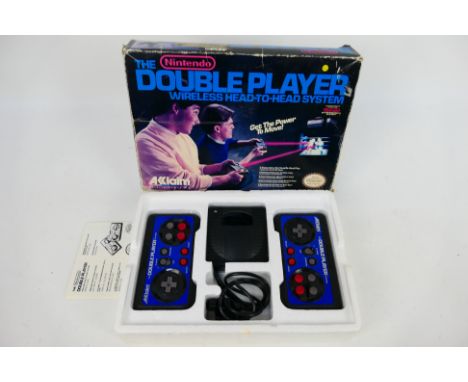 Nintendo - A boxed Nintendo #30401 'The Double Player Wireless Head -To-Head System'. The set appears Mint in Very Good inner