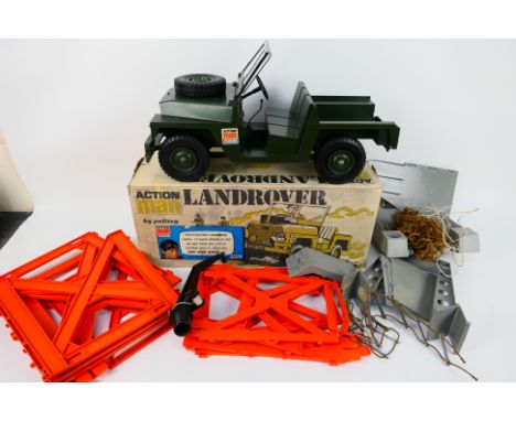 Action Man - Palitoy - A boxed Action Man Palitoy Land Rover with an unboxed Action Man Training Tower. Both items show signs