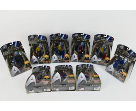 Playmates -- A carded collection of 4" 'Star Trek' themed action figures. Lot includes #61783 Original Spock; #61785 Pike; #6