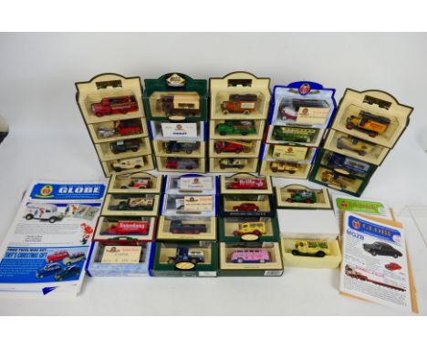 Oxford - Lledo - 34 x boxed vehicles and a quantity of associated Globe magazines. Includes VW bus in flower power livery, Au