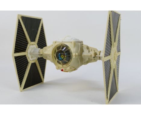 Star Wars - Kenner - An unboxed vintage Kenner / Palitoy Star Wars action figure 'Tie Fighter'. The electronic vehicle is unt