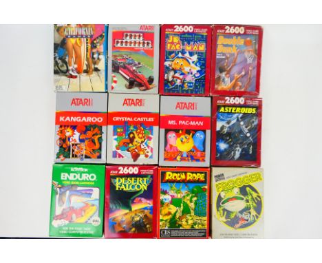 Atari - A collection of 12 boxed Atari video games. Lot includes 'Asteroids'; 'Ms.Pac-Man'; 'Frogger' and similar. Items appe