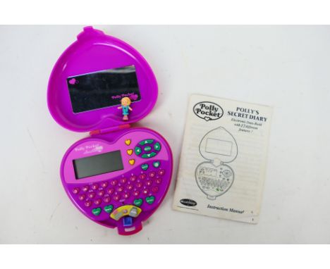 Polly Pocket - Bluebird - An unboxed vintage 1995 'Polly Pocket 'Pollys Secret Diary'. The item comes with instruction bookle
