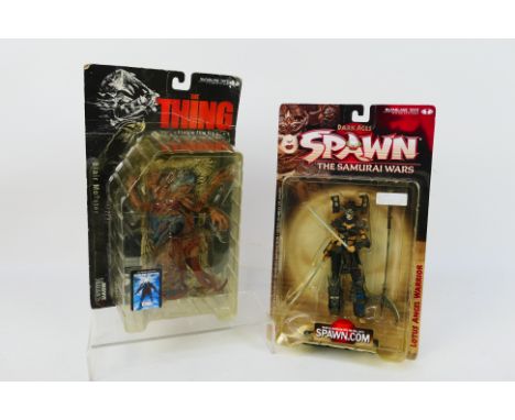 McFarlane Toys - Two collectible carded action figures from McFarlane Toys. Lot consists of 'Movie Maniacs 'The Thing' Blair 