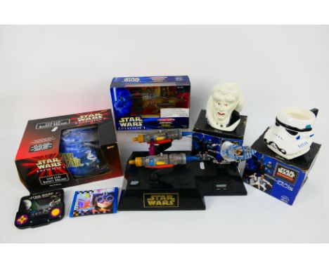 Hasbro - Star Wars - A group of items including 2 x boxed mugs, a boxed Jar Jar cycle helmet, a boxed electronic Fambaa and a