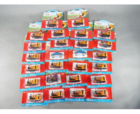 ERTL - 26 carded Thomas the Tank Engine models by ERTL. Lot consists mainly of Duncan and also includes The Fat Controllers c