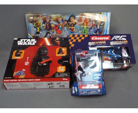 Disney, Carrera, Spy Gear, DC Comics - Four boxed toys and Action Figures including a Carrera 1:20 Scale RC Car, a boxed Disn