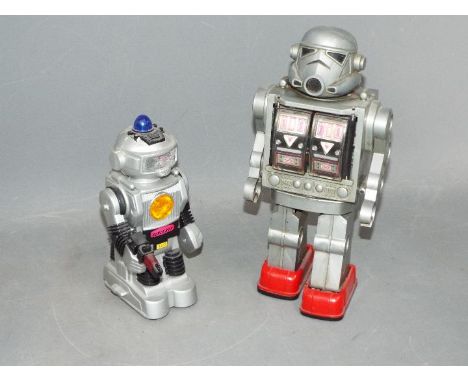 Super Astronaut, Botoy - An unboxed Hong Kong made plastic battery operated "Super Astronauts" Robot . With grey body, red fe