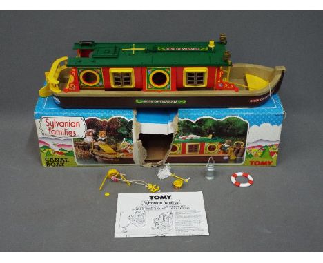 Sylvanian Families, Tomy - A boxed Sylvanian Families Canal Boat / Barge in Playworn condition in a Poor box. The item is unc