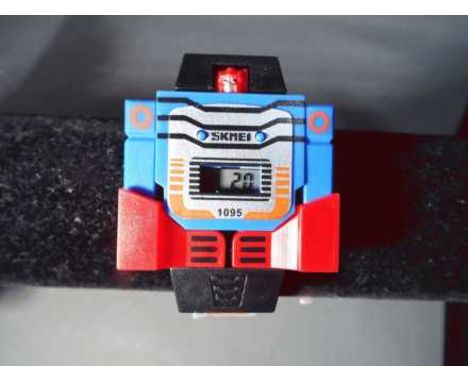 Transformers - a childs Transformer digital watch, model number 1095, LR41 by Skmei (digital display working) 