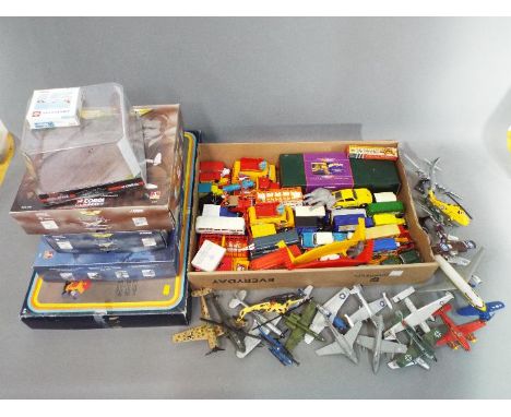 Corgi, Dinky, Zebra Toys and Others - A mixed collection of largely unboxed playworn diecast model vehicles in a variety of s