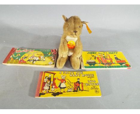 Steiff - a Steiff Kangaroo entitled Kango with button in ear and yellow Steiff tag, approx 14 cm (h) and three pocket comic b